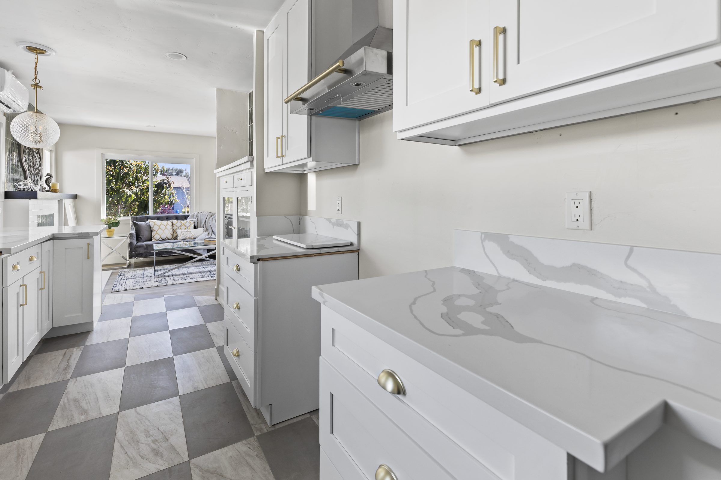 Finished kitchen — custom cabinetry and natural light