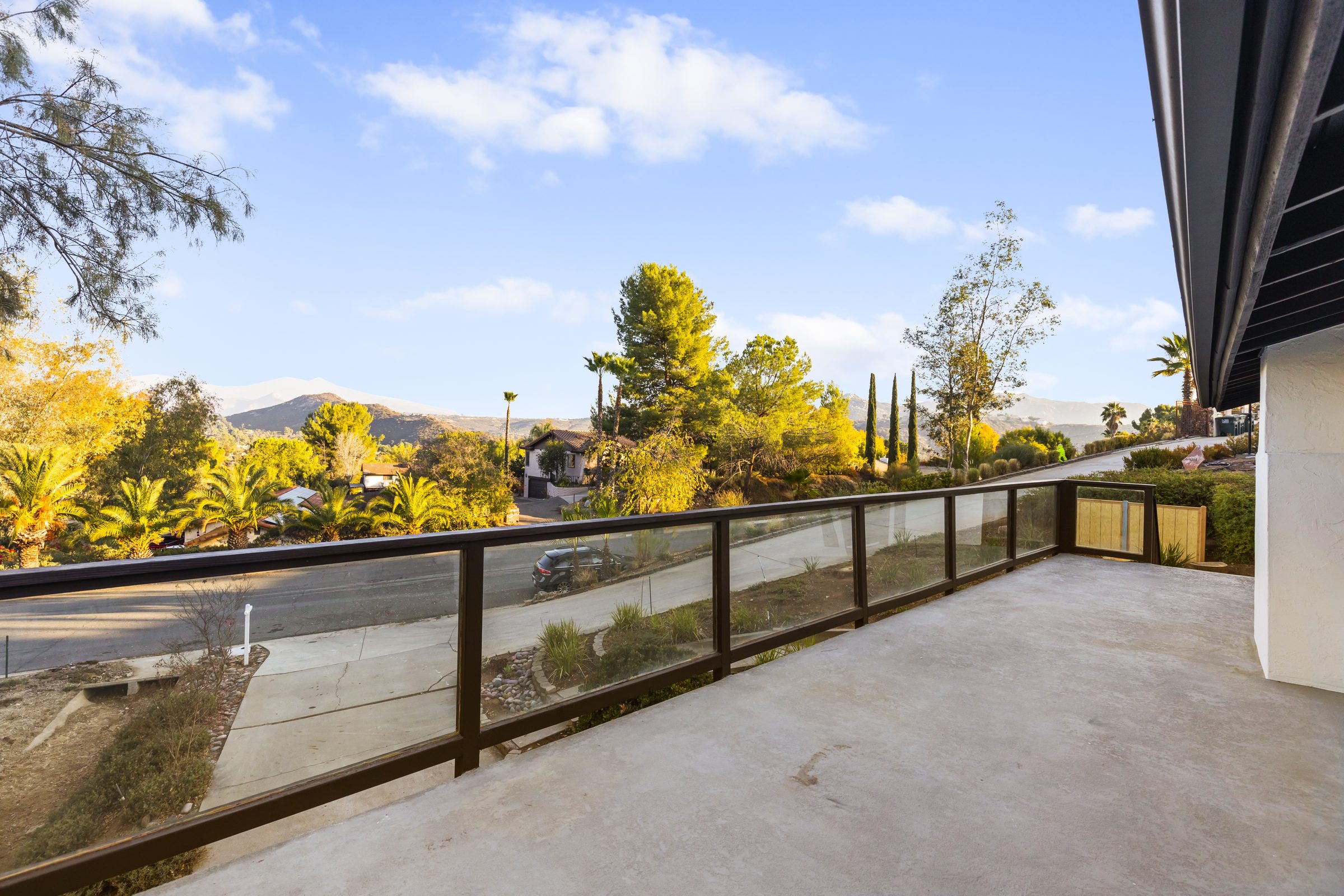 Completed custom home — hillside setting and landscape